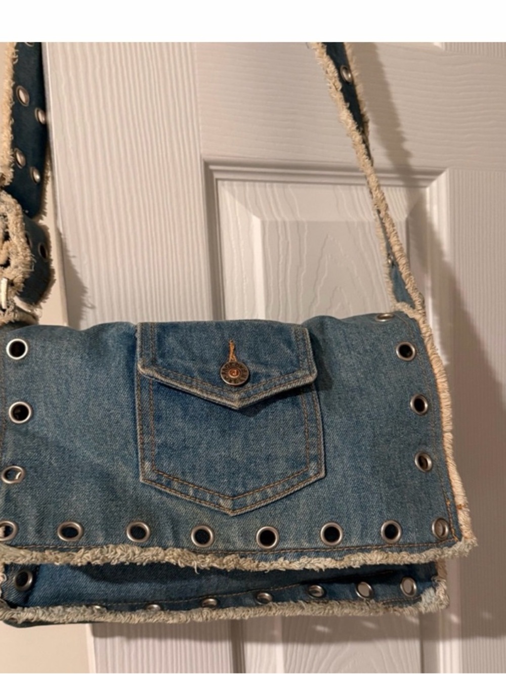 Anthropologie Blue Denim Fringe Crossbody with Grommet Detail